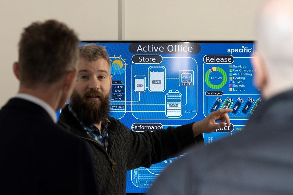 Dr Justin Searle showing the Active Office data screen to visitors